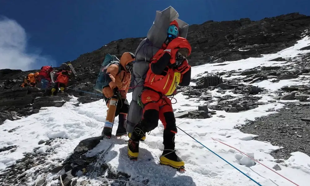 The arduous six-hour rescue by Gelje Sherpa in May came during an especially deadly spring climbing season on the world's highest mountain
