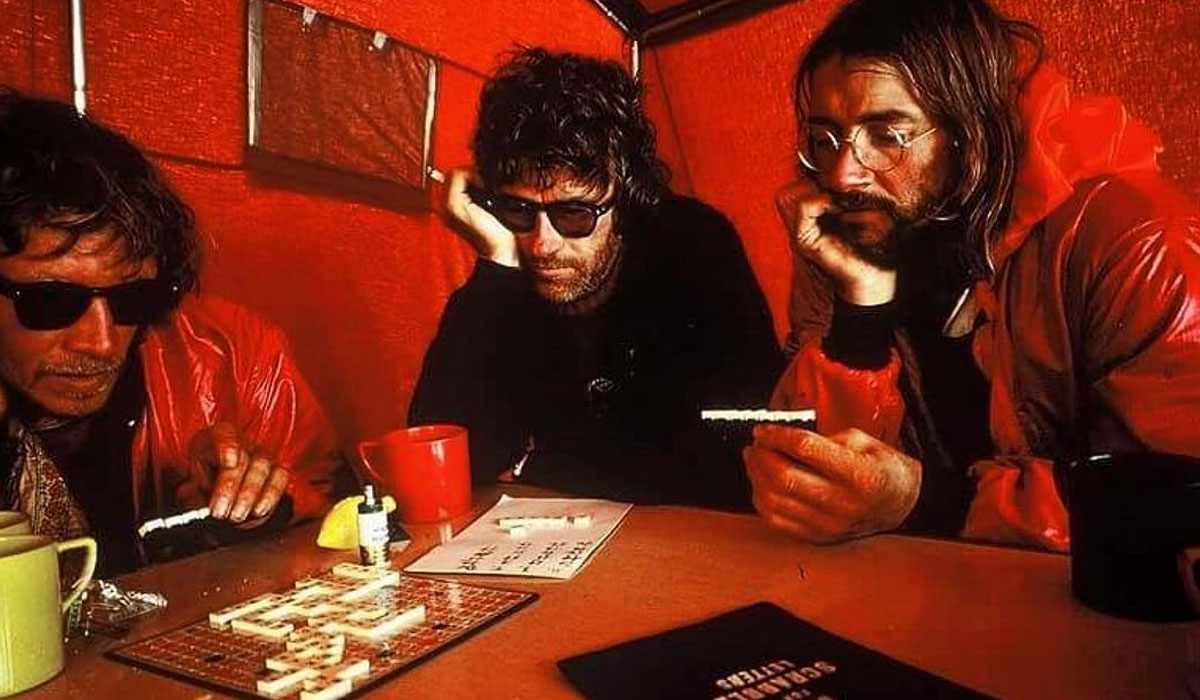 Dougal Haston, Mick Burke & Doug Scott enthralled by a game of Scrabble