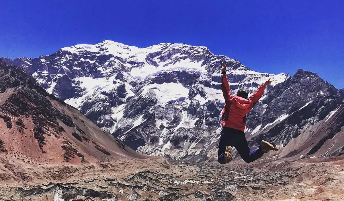 How can you guarantee to summit Mt. Aconcagua?